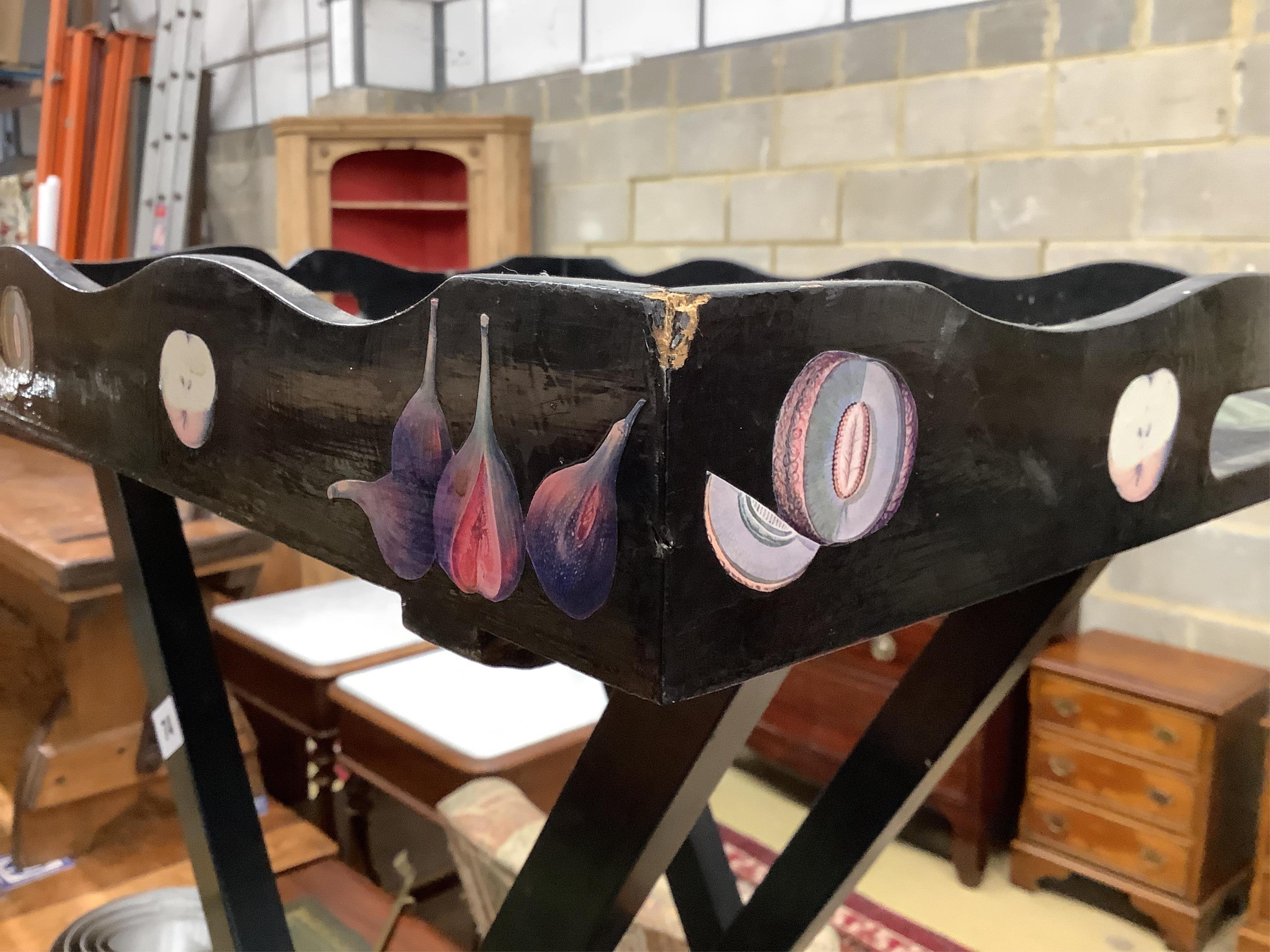 Julia Black, a decoupage butler's tray on folding stand, width 58cm, height 78cm, together with a circular tray. Condition - fair